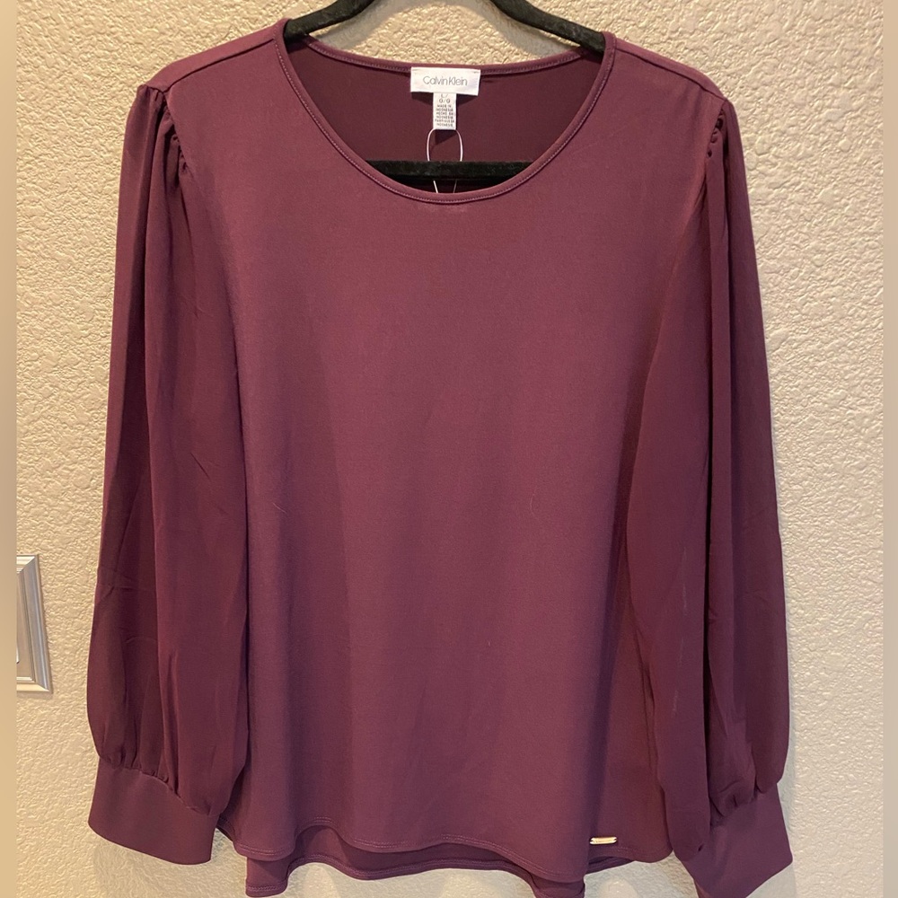 Calvin Klein Women's Maroon Blouse with sheer sleeves.